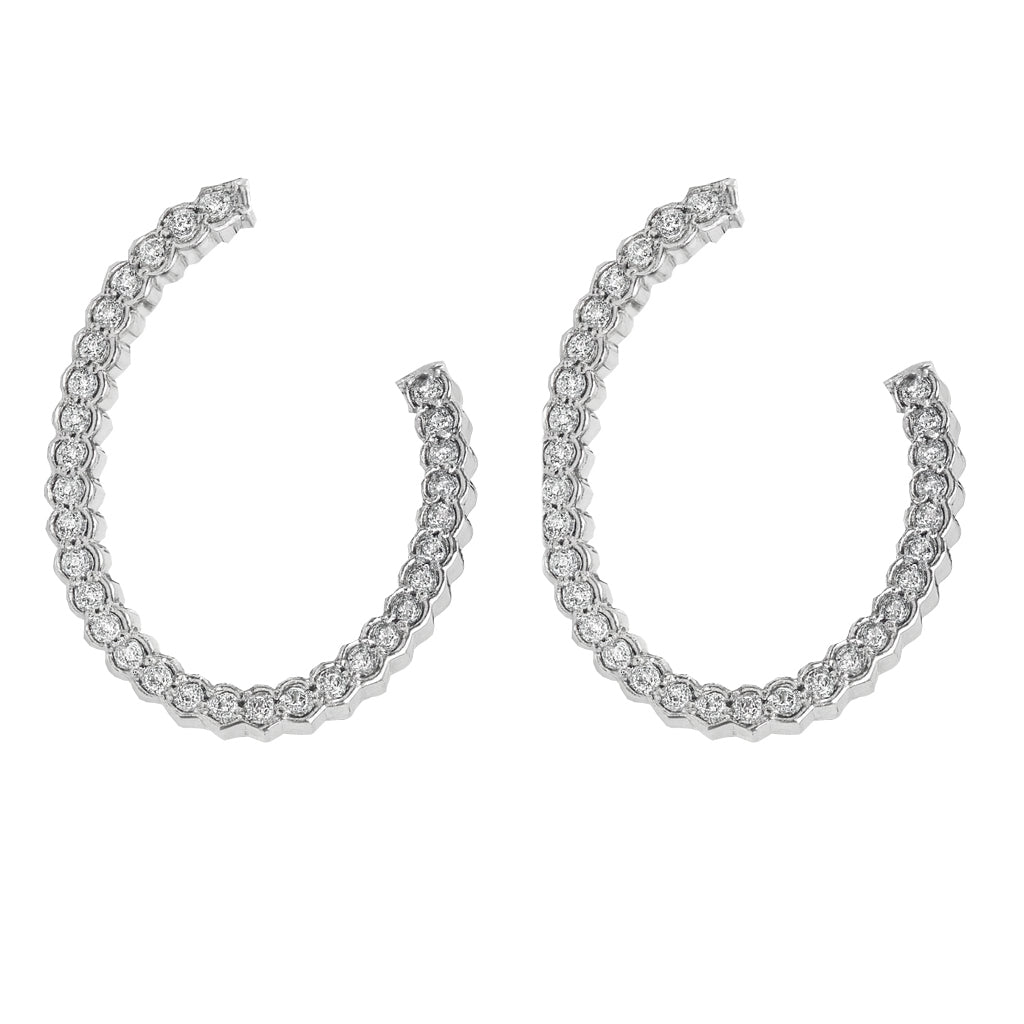 Open oval pattern with studded stone earring